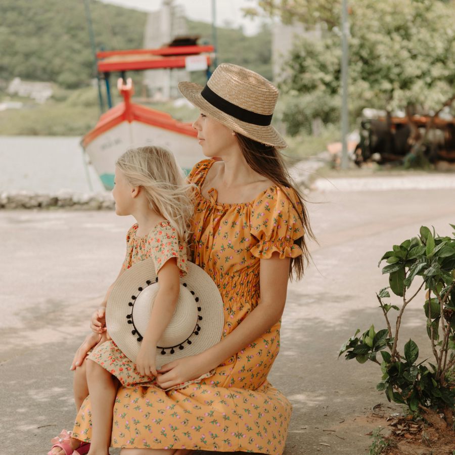 Mom and daughter in the beach